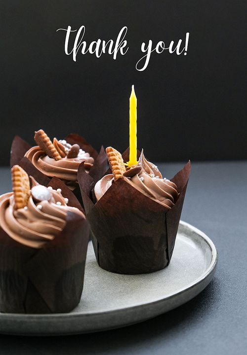 Thank you text greeting card. Chocolate cupcake with candle. Holiday. Celebration background.