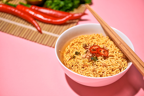 Traditional Asian instant noodles meal with vegetables