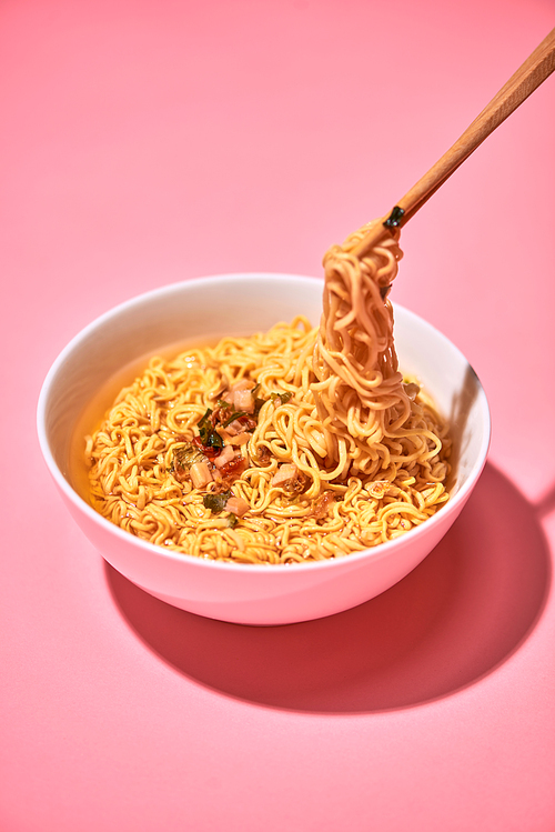 Traditional Asian instant noodles meal with vegetables