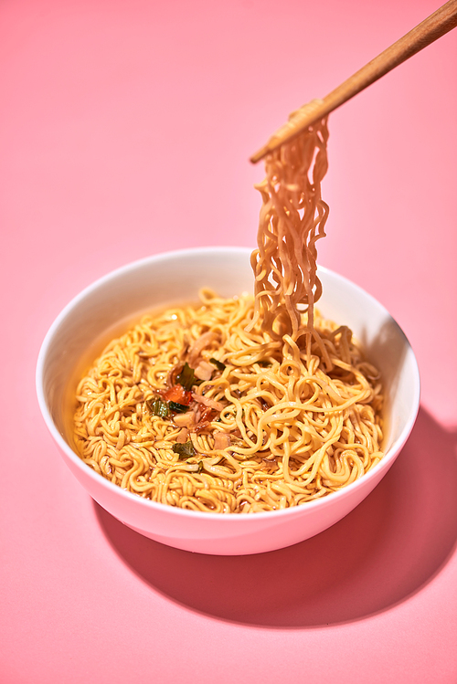 Traditional Asian instant noodles meal with vegetables