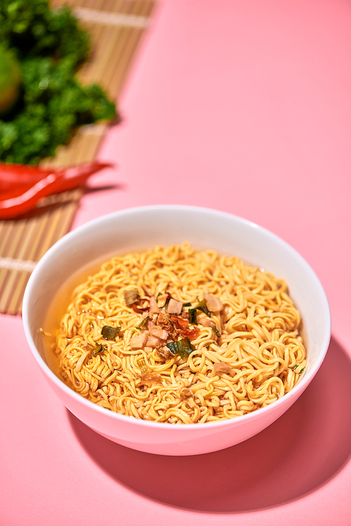 Traditional Asian instant noodles meal with vegetables