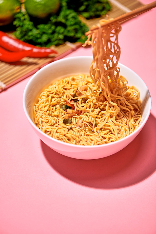 Traditional Asian instant noodles meal with vegetables