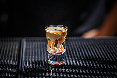 Brain cocktail in a shot glass
