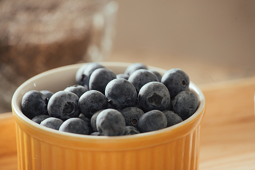 Fresh blueberries on a old wooden table