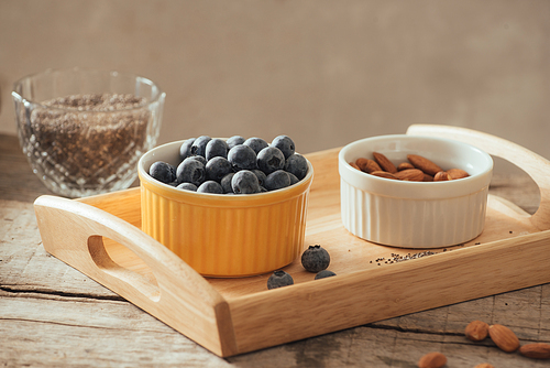 Fresh blueberries on a old wooden table