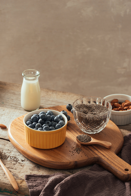 Chia pudding with fresh berries and almond milk. Superfood concept. Vegan, vegetarian and healthy eating diet with organic products