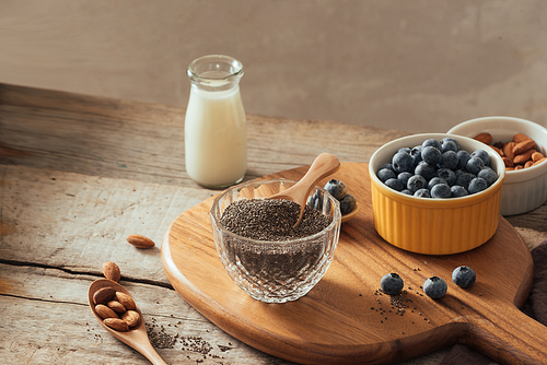 Chia pudding with fresh berries and almond milk. Superfood concept. Vegan, vegetarian and healthy eating diet with organic products