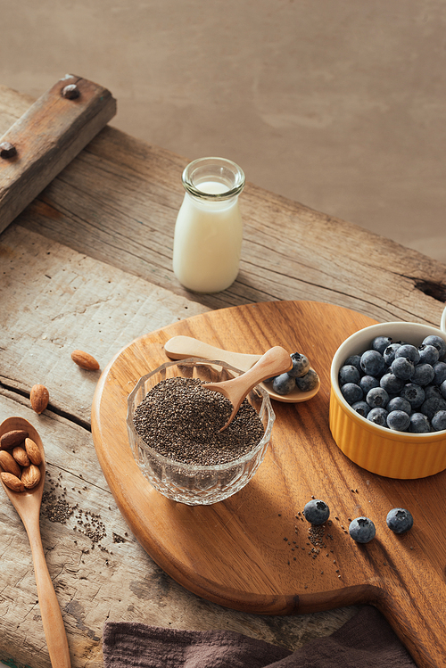 Chia pudding with fresh berries and almond milk. Superfood concept. Vegan, vegetarian and healthy eating diet with organic products