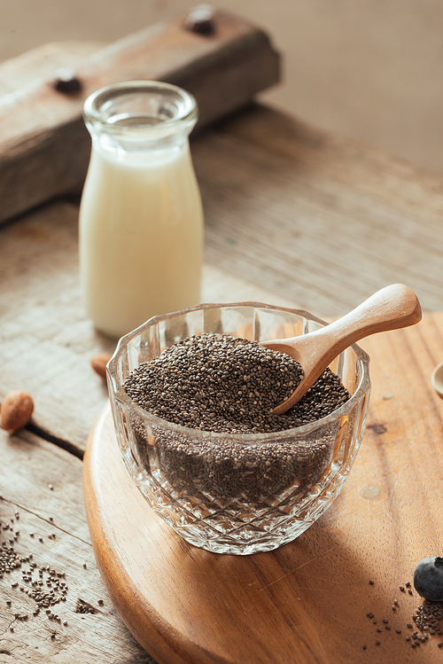 Chia seeds on white background. Chia seeds also known as superfood and used in a wide spectrum of diets.