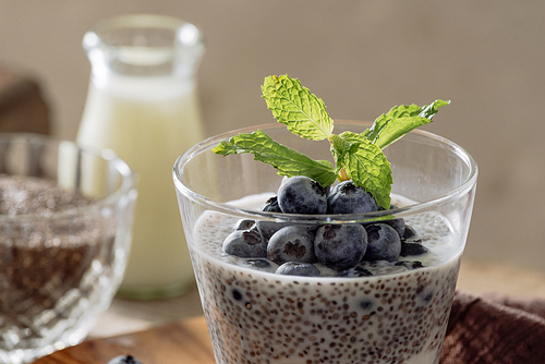 Chia pudding with fresh berries and almond milk. Superfood concept. Vegan, vegetarian and healthy eating diet with organic products