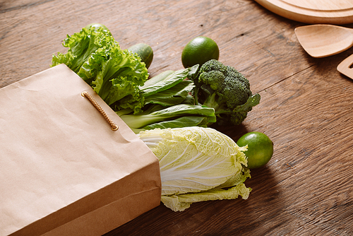 fresh vegetables in a brown paper bag