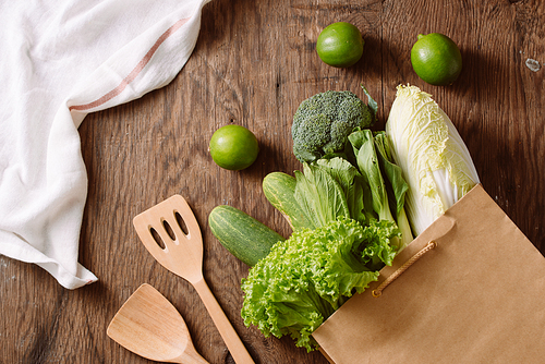 fresh vegetables in a brown paper bag