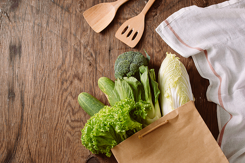 fresh vegetables in a brown paper bag