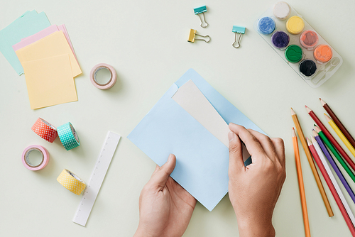 Colored pencils, paper clips and note pad, School supplies, Back to school, School and office supplies