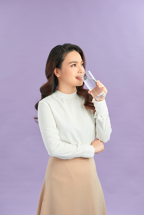 Face portrait of woman drinking water. Smiling girl. Isolated portrait.