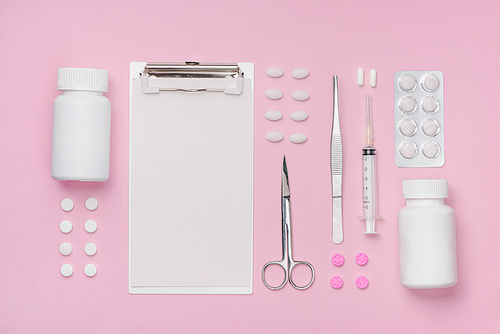 Medical equipment.  Medical concept on pink rose background