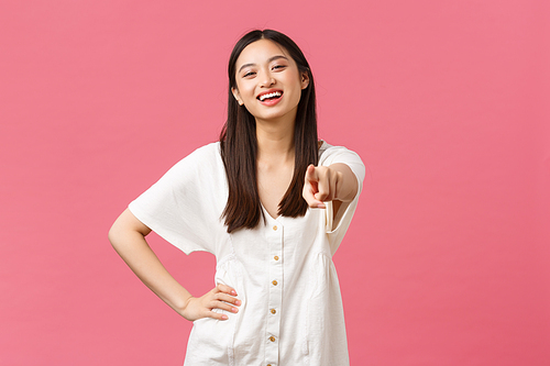 Beauty, people emotions and summer leisure and vacation concept. Cheerful enthusiastic asian girl pointing at camera and inviting customer, picking you, congratulating or encourage visit store.