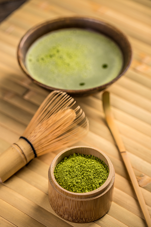 Organic green matcha tea in a bowl