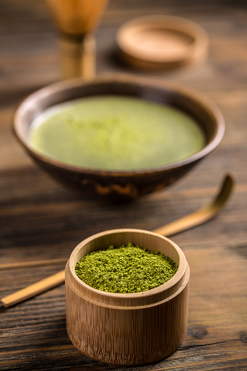 Small bamboo bowl of matcha tea powder
