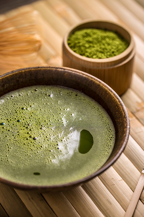 Close up of organic green matcha tea in a bowl