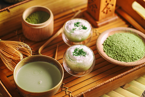 Organic green matcha tea in a glass bowl
