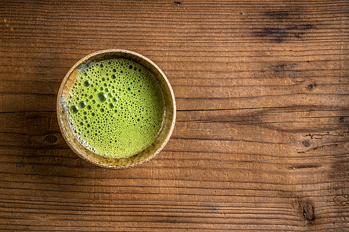 Healthy green tea, matcha tea in bowl