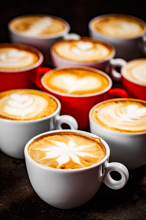 Close up of latte art in different shapes