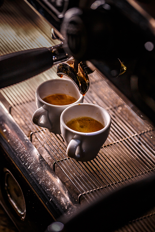 Coffee flowing from the nozzle automatic coffee maker