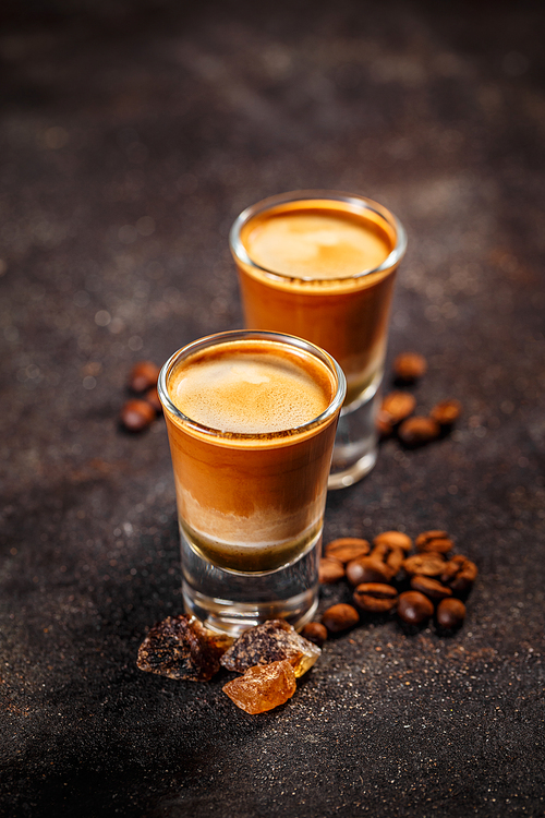 Alcoholic coffee cocktails on dark vintage background