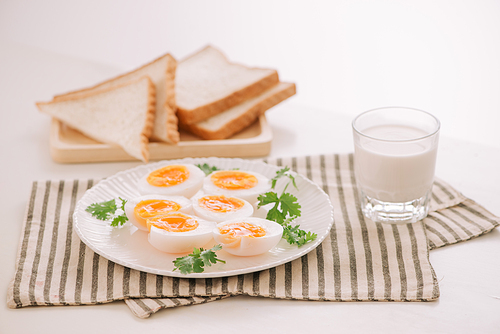 Soft boiled eggs with toast. Healthy fitness breakfast.