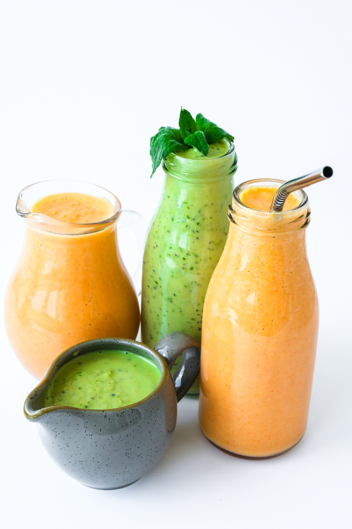 Seasonal Matcha green vegan smoothie with chia seeds and mint pumpkin carrot smoothie drink detox Breakfast. Clean eating, weight loss, healthy dieting food concept Fruit vegetable drink fitness