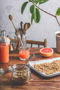 Baked granola for breakfast with grapefruit juice