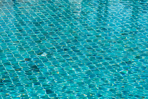 Blue swimming pool water texture reflection lighting