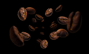 Coffee beans levitate on a black background.