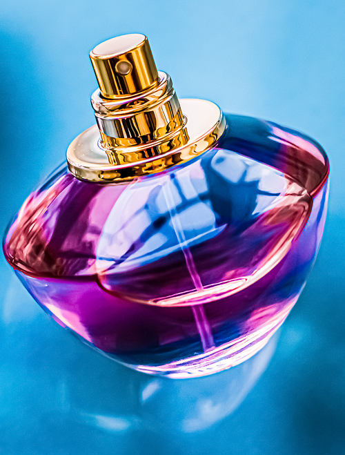 Perfume bottle on glossy background, sweet floral scent, glamour fragrance and eau de parfum as holiday gift and luxury beauty cosmetics brand design.