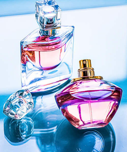 Perfume bottle on glossy background, sweet floral scent, glamour fragrance and eau de parfum as holiday gift and luxury beauty cosmetics brand design.