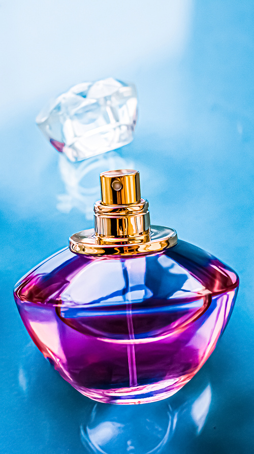 Perfume bottle on glossy background, sweet floral scent, glamour fragrance and eau de parfum as holiday gift and luxury beauty cosmetics brand design.