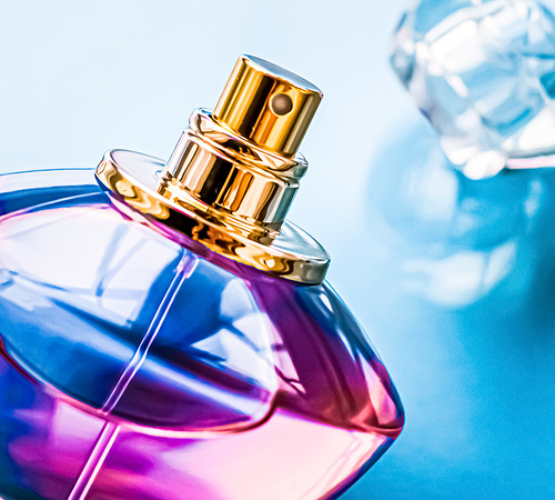 Perfume bottle on glossy background, sweet floral scent, glamour fragrance and eau de parfum as holiday gift and luxury beauty cosmetics brand design.