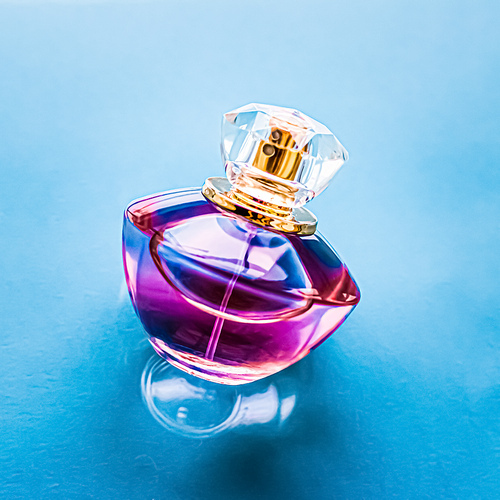 Perfume bottle on glossy background, sweet floral scent, glamour fragrance and eau de parfum as holiday gift and luxury beauty cosmetics brand design.