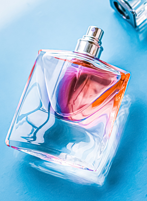 Perfume bottle on glossy background, sweet floral scent, glamour fragrance and eau de parfum as holiday gift and luxury beauty cosmetics brand design.