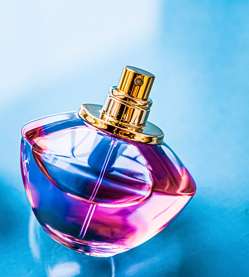 Perfume bottle on glossy background, sweet floral scent, glamour fragrance and eau de parfum as holiday gift and luxury beauty cosmetics brand design.