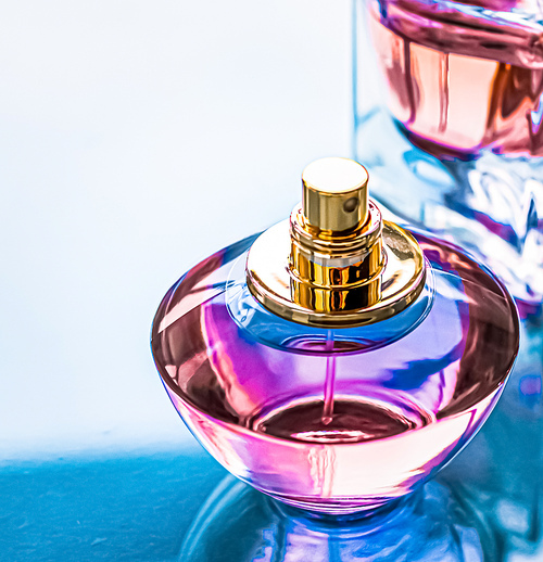 Perfume bottle on glossy background, sweet floral scent, glamour fragrance and eau de parfum as holiday gift and luxury beauty cosmetics brand design.