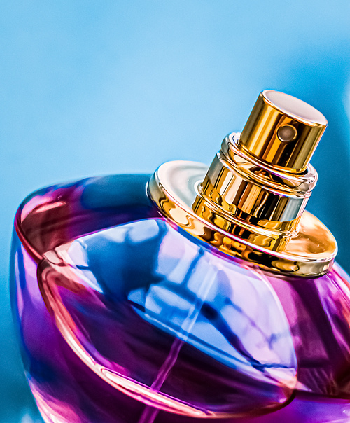 Perfume bottle on glossy background, sweet floral scent, glamour fragrance and eau de parfum as holiday gift and luxury beauty cosmetics brand design.