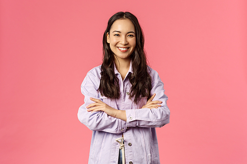 I am ready, lets do it. Enthusiastic attractive korean girl in denim jacket, cross hands chest and smiling assertive, feeling happy and confident, searching career opportunities, pink background.