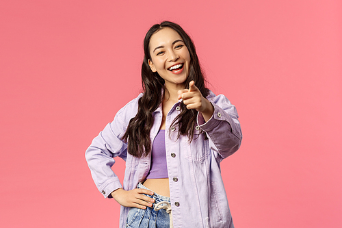 Portrait of enthusiastic good-looking girl smiling and laughing carefree, freelancer inviting start career, find your job at online website, pointing finger camera making assertive choice.