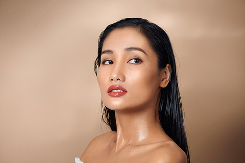 portrait of beautiful young asian woman with flawless skin and perfect make-up