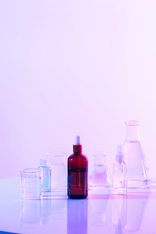 retro brown bottle with flask in science laboratory background