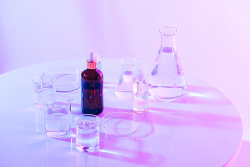 flask of water olution in science laboratory background