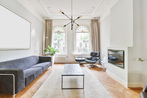 Cozy living room with large sofa and TV