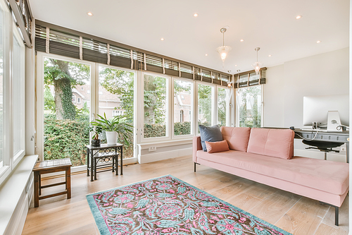 Luxurious living room with soft sofa and armchairs